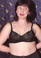 Horny brunette inviting some hard fuck as she opens wide to reveal her hairy mature hole!