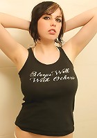 Naughty brunette rubs oil all over her big natural boobs