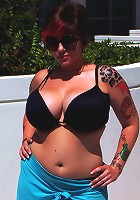 Dors Feline gets her boobs oiled up by the pool