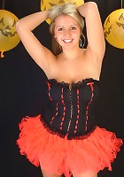 Emily's big boobs bulges out of her Halloween corset