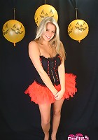 Emily's big boobs bulges out of her Halloween corset