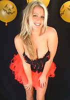 Emily's big boobs bulges out of her Halloween corset