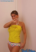 Busty Megan rubs baby oil all over her huge rack