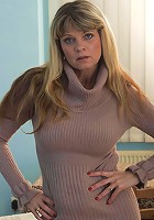 Horny MILF stuffing her wet pussy