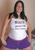 Busty Britains babe of 2008 Kim B showing off her big melons