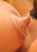 Babe Katka playing with her large hooters and a suction pump