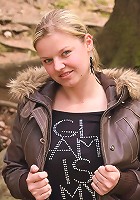 Sima strips to show off her melons and curvy body in a forest