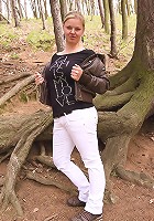 Sima strips to show off her melons and curvy body in a forest