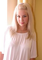 Shy cutie with a nice set of delicious natural boobs.