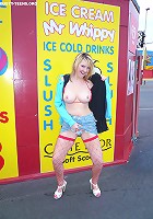 Crazy young bitch poses nude and in sexy stocking at the harbour and exposes her big hooters