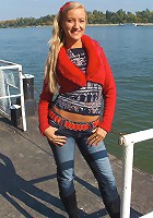 Sweet awesome blondie with big natural mammaries strips at the beach