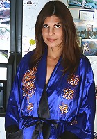 Veronica N presses the juice from a strawberry with her pussy