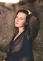 Jastin shows her big tits in the hunting lodge