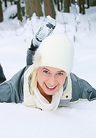 Busty teenie toying pussy in snow