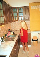 Busty blonde fucked in a kitchen