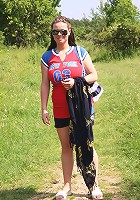 Busty babe strips in nature