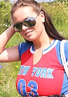 Busty babe strips in nature