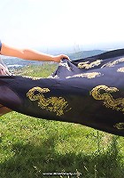 Busty babe strips in nature